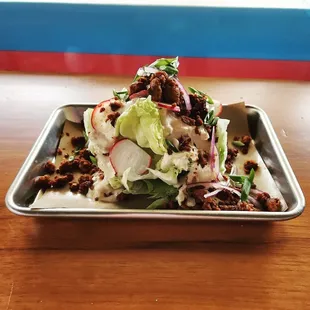 Wedge salad with spicy chorizo.