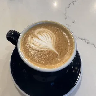 Hannah creates a wonderful cappuccino for you. She brings it to your table. Personally I love this place I come here almost every day.