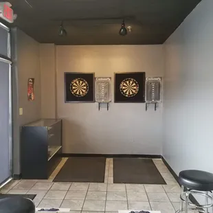 darts on the wall in a restaurant