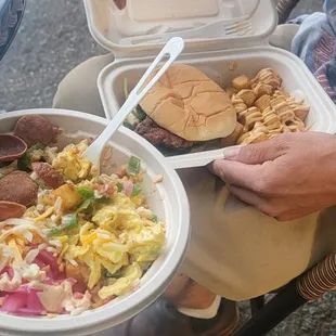 a person holding a bowl of food