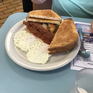 Eggs over medium w/bacon toast and home fries - August 2021
