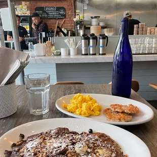 a plate of pancakes and eggs