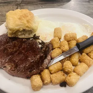 8oz ribeye, 2 eggs, Tator tots, biscuit
