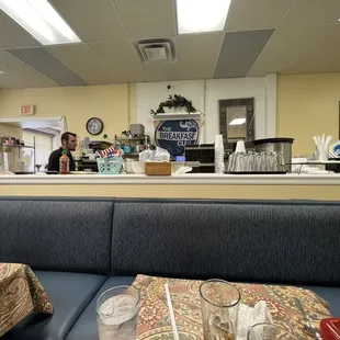 a woman sitting at the counter