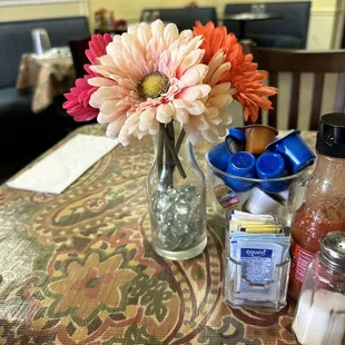 Dirty salt/pepper shakers.  The yucky, fake, dusty flowers on the tables were gross.
