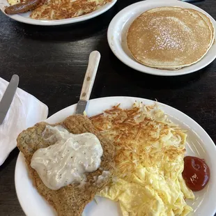Bottom: the classic egg &amp; meat platter with country fried steak ($6.95) Top: The breakfast club special ($7.95)