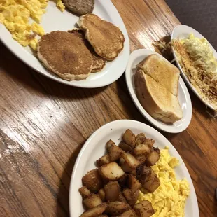 Kids meal with pancakes, early bird special, and meat omelette