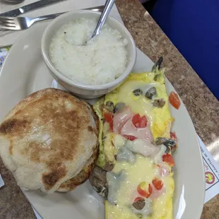 Omelette, grits, and an English muffin