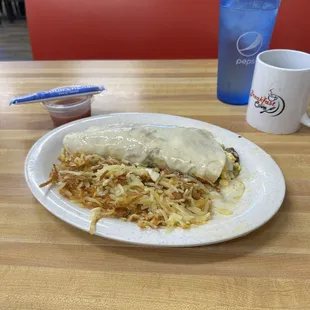 Breakfast Burrito with sausage &amp; hash browns.