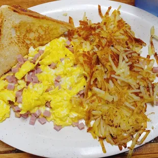 Ham and eggs with hash browns and toast