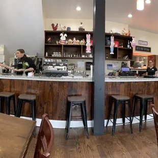 a view of the bar and dining area