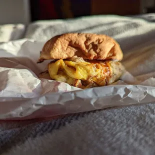 Breakfast little sandwich with sausage and Tapatio, reheated