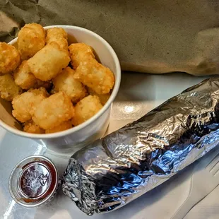 tots $6 + breakfast burrito $9.19 + avocado $2.50