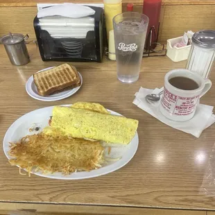 Big 3 Egg Omelet- onions, pepper, tomatoes, bacon, and sausage with Hash browns &amp; coffee