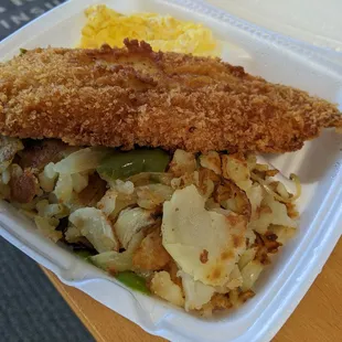 a meal in a styrofoam container