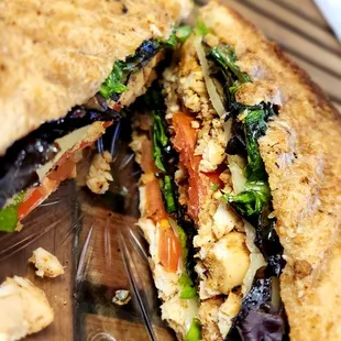 The Italian Job: Chicken, Swiss, Spring Mix, Tomato, and Pesto Oil on White Bread.