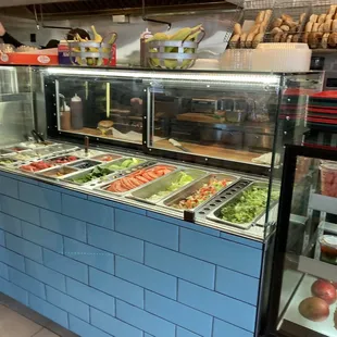 a man standing in front of a buffet