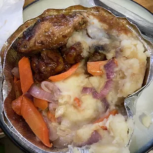 Chicken wings with mashed potatoes and carrots