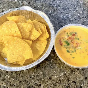 Queso Dip (chorizo on bottom) and Chips