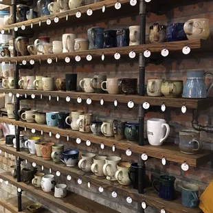Wall of mugs