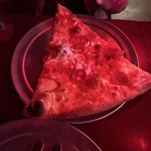 Pepperoni pizza slice