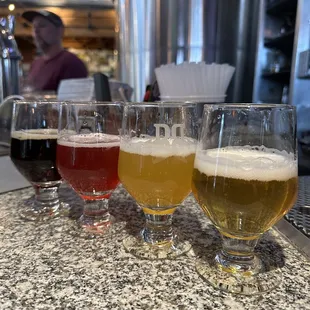 a row of beer glasses