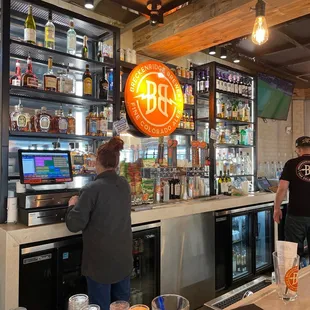 a man and a woman at the bar