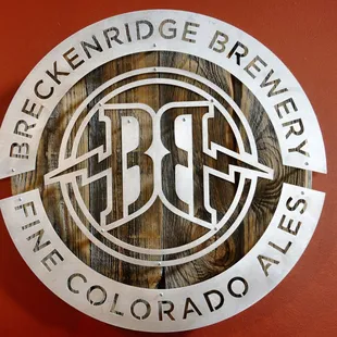 the logo on the wall