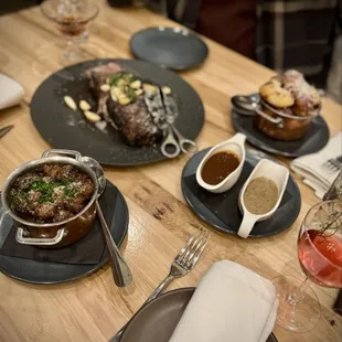 Ribeye steak dinner with French side dishes