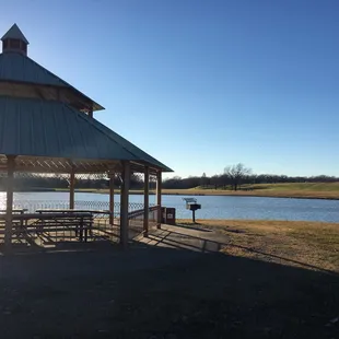 Nice lakeside gazebo with tables and bbq grill