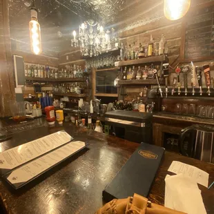 a baseball glove on the bar