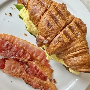 Avocado Toast on croissant, side bacon