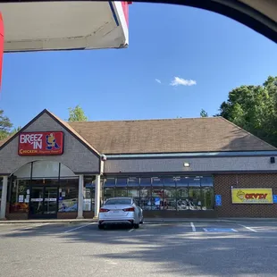 a car parked in front of a store