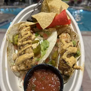 Mahi Tacos. I wasn&apos;t expecting much and this was surprisingly tasty! Yummm! Get the fish tacos here peeps.