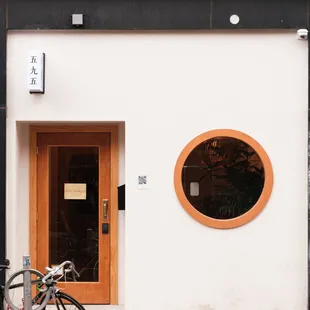 a bicycle parked in front of a building