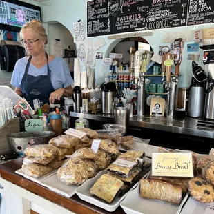 a woman working behind the counter