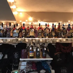 a shelf full of bottles of wine