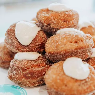 Daily doughnut rolled in cinnamon sugar w/ buttercream icing