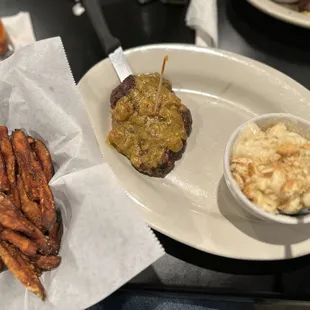 Filet topped with crawfish Julie, sweet potato fries and Mac n cheese