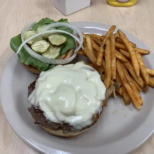 Mushroom Swiss burger with fries