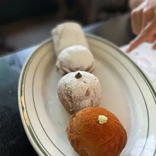 Beignet flight (crawfish, chocolate, apple, and plain)