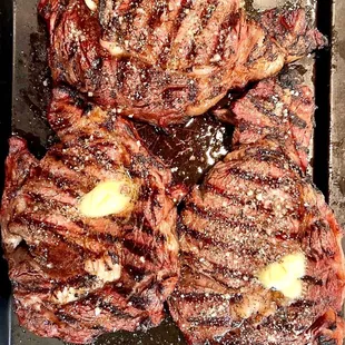 steaks being cooked