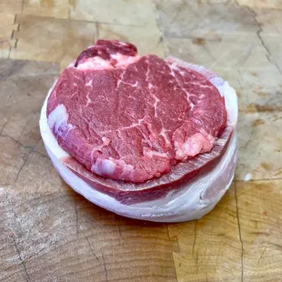 a piece of beef on a cutting board