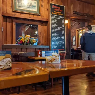 a man standing in a restaurant