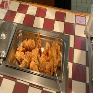 a tray of fried chicken