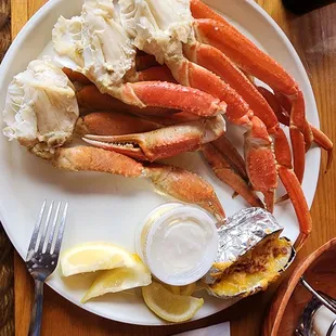 a plate of crab legs and crab legs