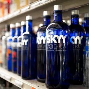 blue bottles on a shelf