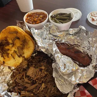 I got the small brisket, smoked sausage, baked beans, and green beans.