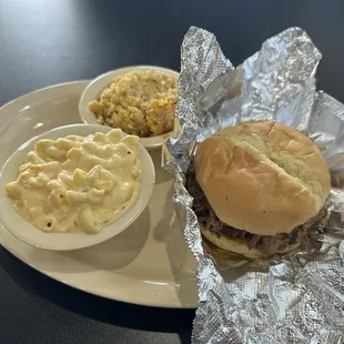 Brisket sandwich, Mac and cheese, and corn pudding.