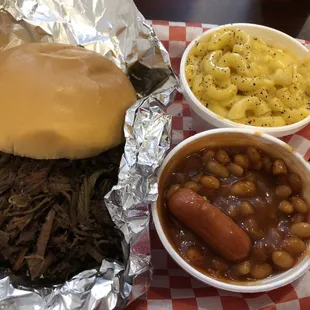 Beef brisket sandwich, mac n cheese (homemade), baked beans (with mini hot dogs)